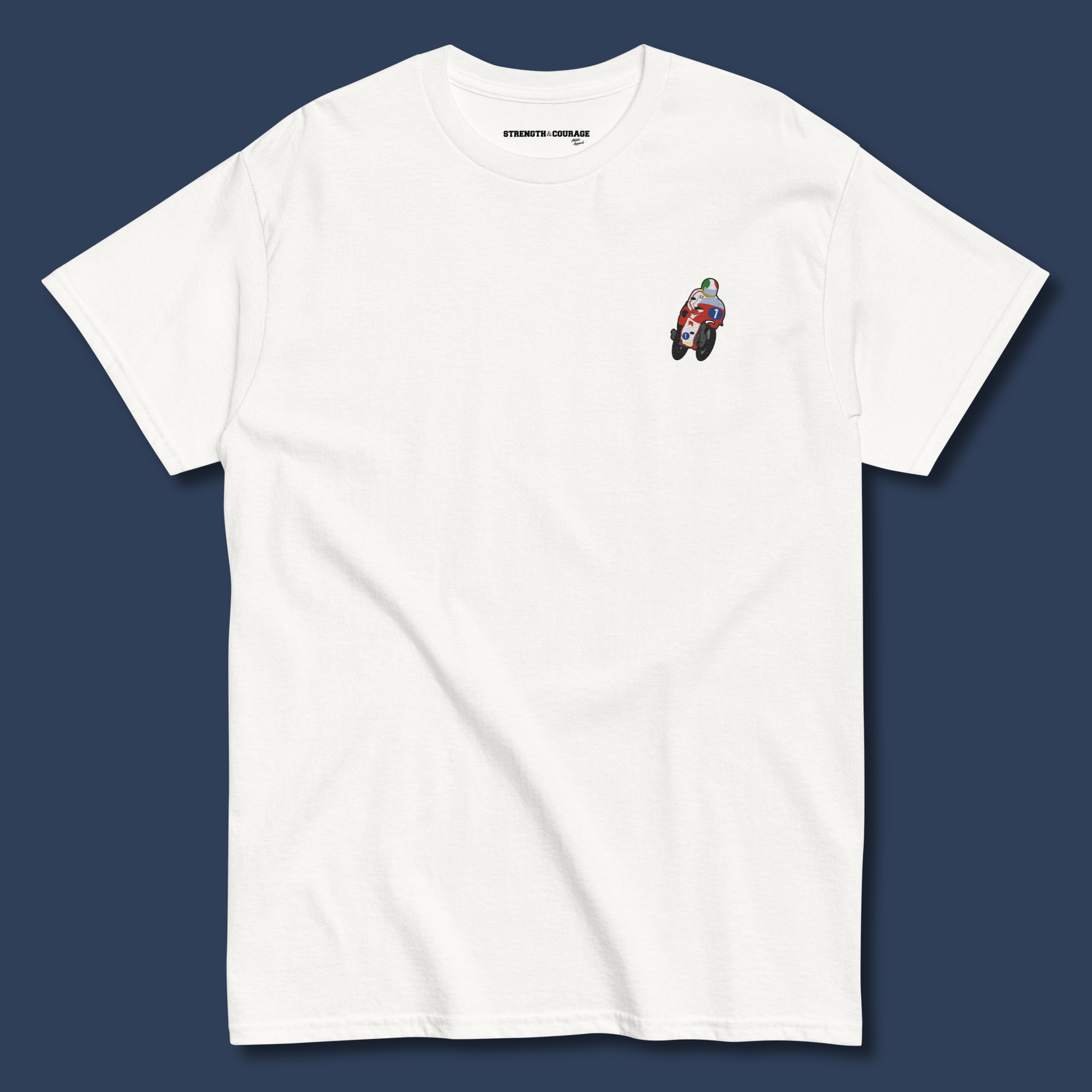 Embroidered cotton T-shirt featuring Giacomo Agostini riding his legendary MV Agusta, celebrating the golden era of MotoGP and one of the greatest World Champions in racing history. This short sleeve T-shirt design captures pure speed, style, and heritage. Made from premium cotton, it’s a timeless graphic tee and perfect Tshirt gift for him with free shipping included. Honor Agostini’s racing legacy and Italian excellence. Shop now and wear motorcycle history!