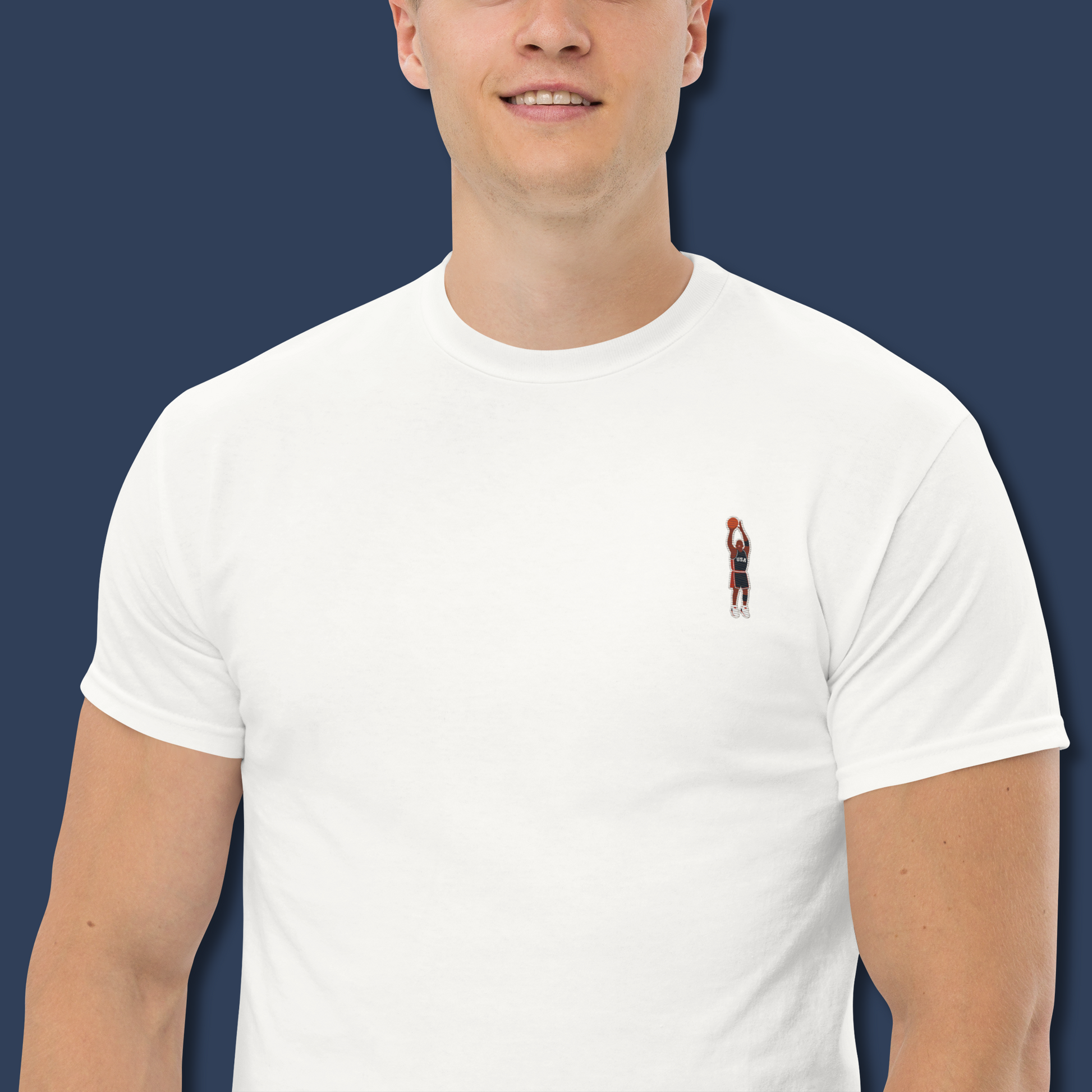 Celebrate Michael Jordan and the legendary Dream Team with this premium embroidered T-shirt. Inspired by the Olympic Games and Basketball history, this timeless design is perfect for true fans of the game.