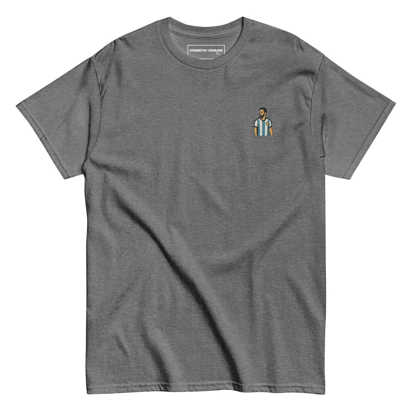Men's (or Unisex) cotton graphic tee featuring a small, retro-inspired embroidered patch/graphic of football player Lionel Messi in the Argentina (AFA) 'Albiceleste' jersey. GOAT, soccer, football, vintage style, Strength and Courage brand.