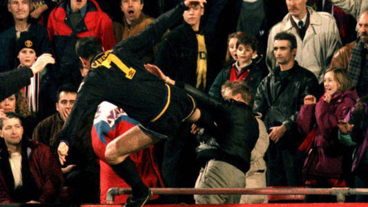 Eric Cantonà, the iconic Manchester United star, captured in one of the most unforgettable and controversial moments in Premier League history , his Kung fu Kick to a supporter.