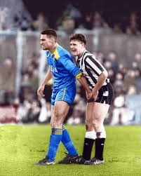 Vinnie Jones in Wimbledon jersey having a "met" with Paul Gascogne 