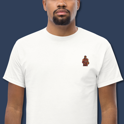 Men's (or Unisex) white cotton t-shirt featuring a small, vintage-inspired embroidered patch/graphic of NBA basketball player LeBron James in his L.A. Lakers jersey (number 23). Graphic tees, gift for him, retro style, Strength and Courage brand.