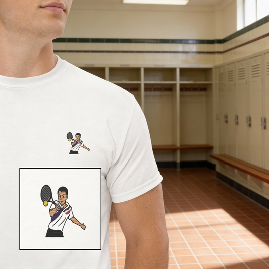White cotton short sleeve t-shirt featuring a small, high-quality embroidery of tennis legend Michael Chang in a white and black kit, perfect for ATP tennis fans.