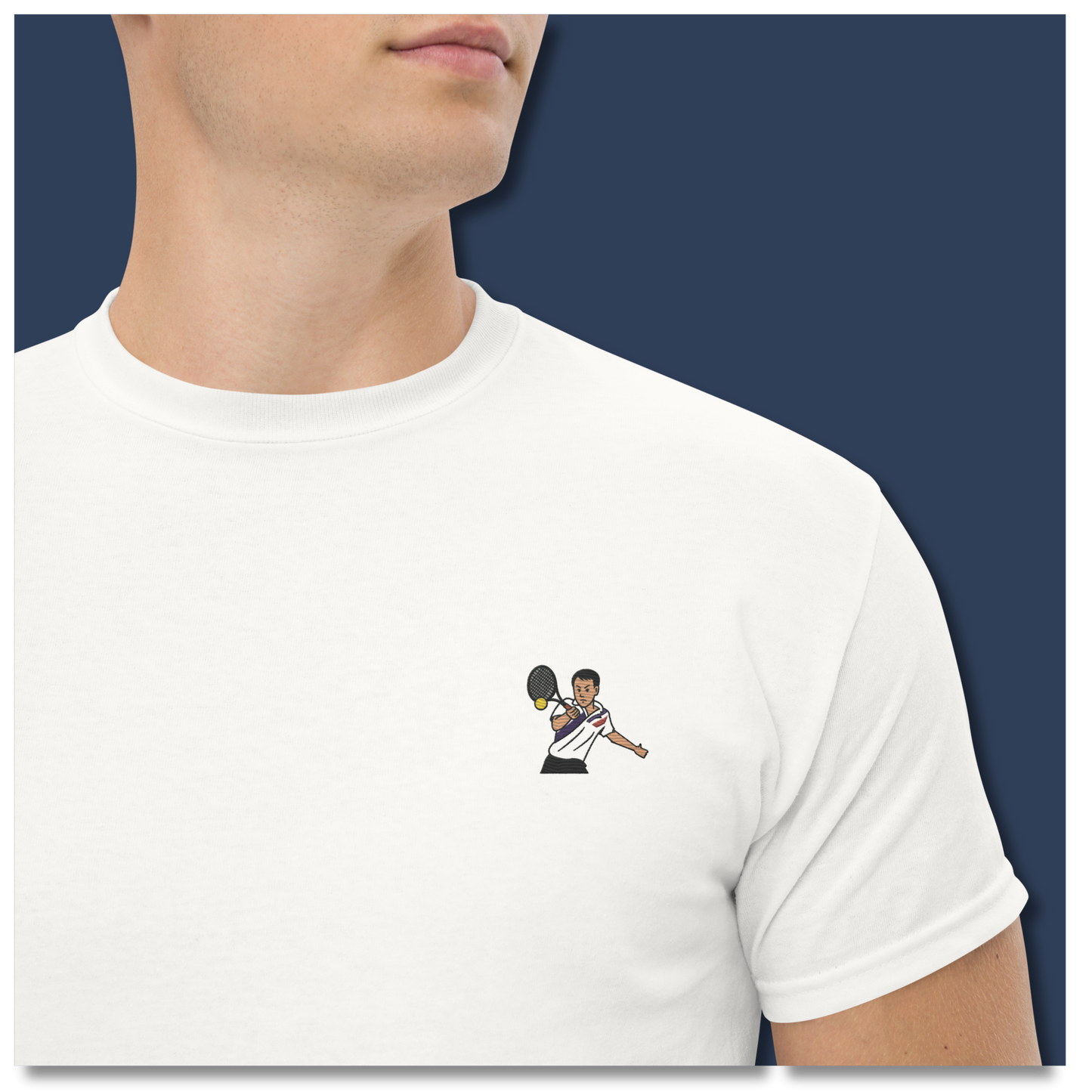 White cotton short sleeve t-shirt featuring a small, high-quality embroidery of tennis legend Michael Chang in a white and black kit, perfect for ATP tennis fans.