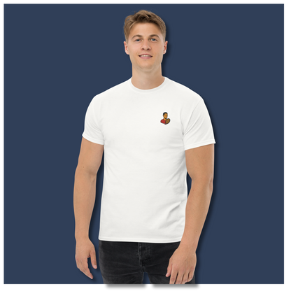 White cotton short sleeve t-shirt featuring a small, minimalist embroidered graphic design of tennis player Novak Djokovic in a red shirt holding a racket.