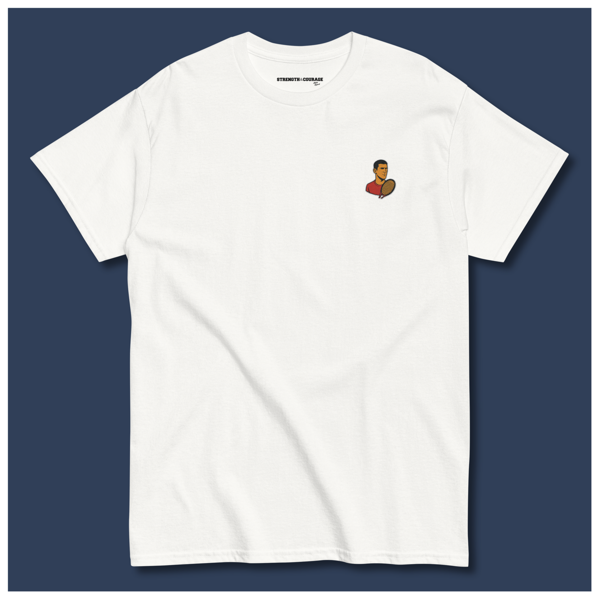White cotton short sleeve t-shirt featuring a small, minimalist embroidered graphic design of tennis player Novak Djokovic in a red shirt holding a racket.