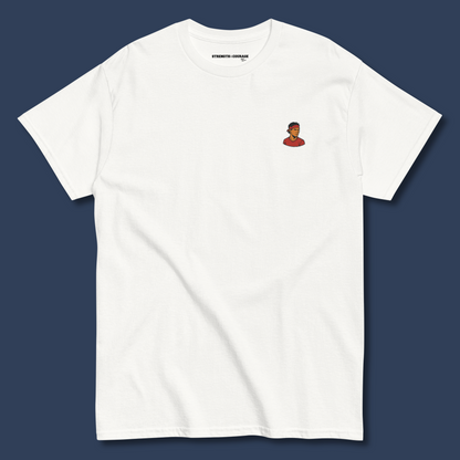 White premium cotton short sleeve t-shirt featuring a small, detailed embroidery of tennis legend Rafael Nadal in his signature pose.