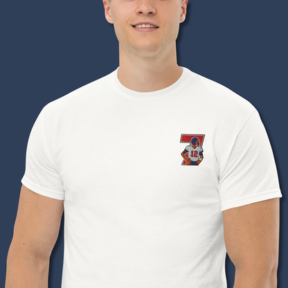 Embroidered cotton T-shirt featuring Tom Brady captured mid-throw in an iconic NFL moment. This vintage-inspired T-shirt design celebrates his unmatched Super Bowl legacy and leadership on the field. Made from premium cotton, it’s a stylish graphic tee for true football fans. A perfect Tshirt gift for him with free shipping included. Honor Tom Brady’s greatness and Nike-inspired athletic spirit with this exclusive design.