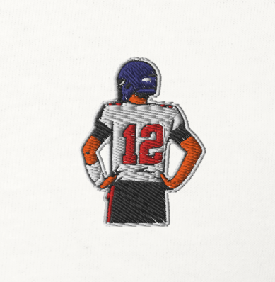 Embroidered cotton T-shirt featuring Tom Brady, the legendary Tampa Bay Buccaneers quarterback, captured mid-throw in an iconic NFL moment. This vintage-inspired T-shirt design celebrates his unmatched Super Bowl legacy and leadership on the field. Made from premium cotton, it’s a stylish graphic tee for true football fans. A perfect Tshirt gift for him with free shipping included. Honor Tom Brady’s greatness and Nike-inspired athletic spirit with this exclusive design.